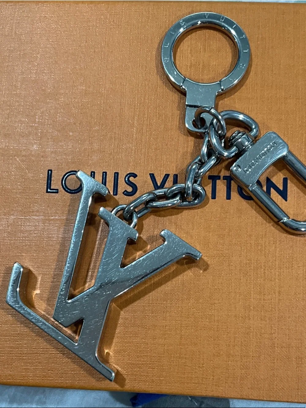 Louis Vuitton Silver-Tone LV Logo Key Holder